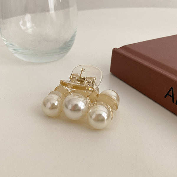 Elegant Pearl Crab Pins – Stylish Hair Accessories in 3 Designs!